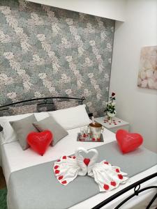 Postel nebo postele na pokoji v ubytování PONTE VALLE B&B POMPEI