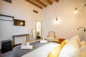 Katil atau katil-katil dalam bilik di Azacanes Hostal Boutique Toledo