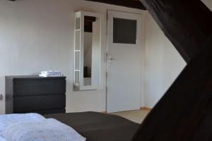 Postel nebo postele na pokoji v ubytování Horský hotel Anděl