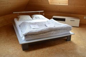 Postel nebo postele na pokoji v ubytování Horský hotel Anděl
