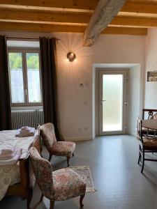 Postel nebo postele na pokoji v ubytování B&B La Corte del Segrino
