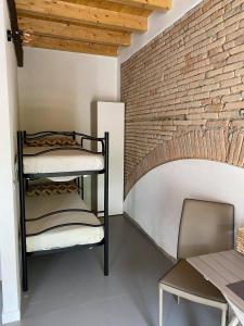 Postel nebo postele na pokoji v ubytování B&B La Corte del Segrino