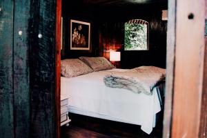 Posteľ alebo postele v izbe v ubytovaní Pipa Merlot