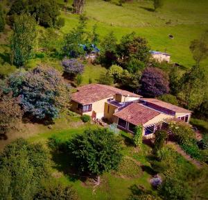 an aerial view of a house in a field at Finca Agrreste in Nemocón