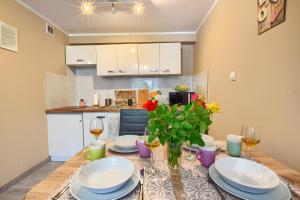 Kuchyňa alebo kuchynka v ubytovaní Apartamenty Perła Szczyrku