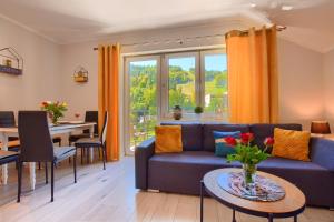 Posedenie v ubytovaní Apartamenty Perła Szczyrku