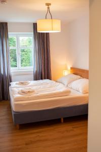 Ferienwohnung auf ehemaligen Bauernhof in der Nähe von Bamberg tesisinde bir odada yatak veya yataklar