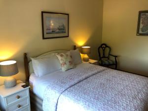 Ένα ή περισσότερα κρεβάτια σε δωμάτιο στο Dunaree Bed and Breakfast