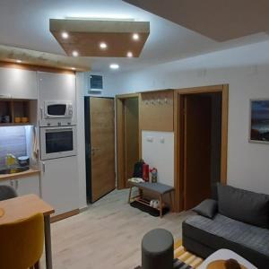 A kitchen or kitchenette at APARTMAN FEELING