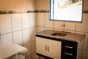Virtuvė arba virtuvėlė apgyvendinimo įstaigoje Fortuna Casas de Campo