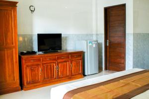 TV a/nebo společenská místnost v ubytování Putu Guest House 2