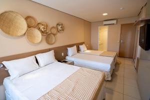Кровать или кровати в номере Fortaleza Mar Hotel