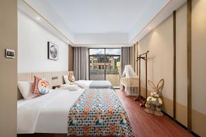 Postel nebo postele na pokoji v ubytování Meeteem Boutique Hotel