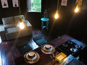an overhead view of a living room with a table at Pipa Malbec in Petrópolis