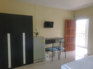 TV a/nebo společenská místnost v ubytování Ek Residence Banchang City