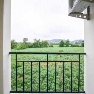 Balkón nebo terasa v ubytování Ek Residence Banchang City