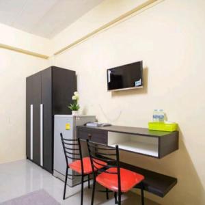 Kuchyň nebo kuchyňský kout v ubytování Ek Residence Banchang City