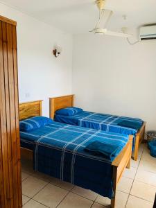 Oceanic View Apartments客房内的一张或多张床位