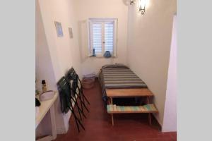 Postel nebo postele na pokoji v ubytování Appartamento panoramico: Residence Ulivi e Sole