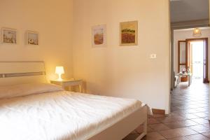 Posteľ alebo postele v izbe v ubytovaní Casa al Castello con Balcone sul Mare