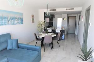 A kitchen or kitchenette at Flamenca Village Penthouse
