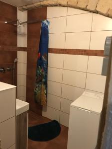 Koupelna v ubytování Käpt`n Jensens Kajüte + 37 fotografií