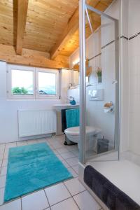 Koupelna v ubytování BergFux Ferienhaus - hochwertige Ausstattung