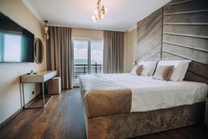 Postel nebo postele na pokoji v ubytování Inex Olgica Hotel & SPA