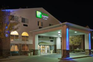 a hotel with a sign on the side of a building at Holiday Inn Express Hotel & Suites Pierre-Fort Pierre by IHG in Fort Pierre