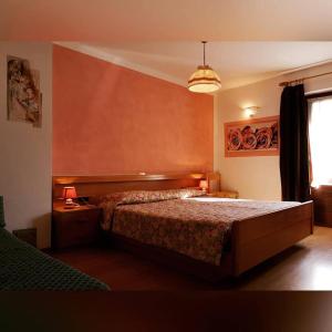 Posteľ alebo postele v izbe v ubytovaní Residence Capriolo