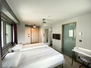 Ένα ή περισσότερα κρεβάτια σε δωμάτιο στο Eresin Hotels Express