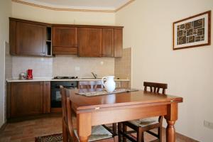 A kitchen or kitchenette at Appartamenti San Rocco