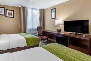 Ένα ή περισσότερα κρεβάτια σε δωμάτιο στο Comfort Inn Edison - New Brunswick
