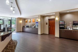 a lobby of a hotel with a coffee shop at Comfort Suites Manchester near Arnold AFB in Manchester