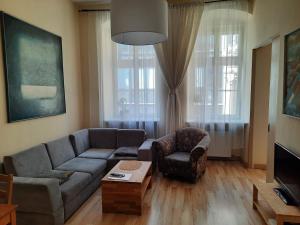 a living room filled with furniture and a window at Good Night in Wroclaw - Aries in Wrocław