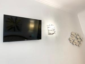 TV a/nebo společenská místnost v ubytování Hotel Regina Margherita