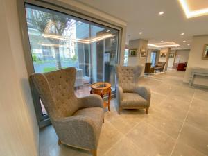a waiting room with two chairs and a table at Eresin Hotels Express in Istanbul
