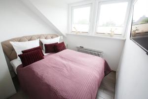Postel nebo postele na pokoji v ubytování Kajüte 23