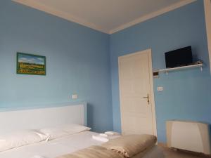 TV a/nebo společenská místnost v ubytování Hotel The Marins + 24 fotografií