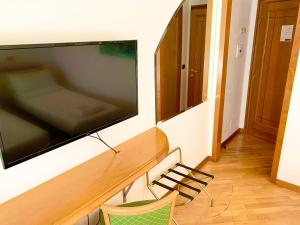 TV a/nebo společenská místnost v ubytování Hotel Regina Margherita