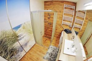 Kúpeľňa v ubytovaní SPA Polanki PARK Nemo Apartamenty Kołobrzeg