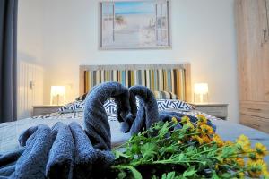 Posteľ alebo postele v izbe v ubytovaní SPA Polanki PARK Nemo Apartamenty Kołobrzeg