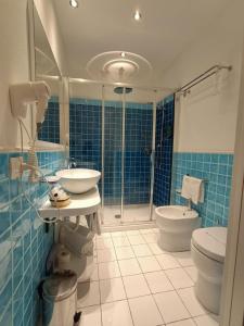 Kúpeľňa v ubytovaní Janas Hotel
