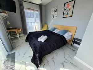 Posteľ alebo postele v izbe v ubytovaní Apartments Warsaw Pawia by Noclegi Renters