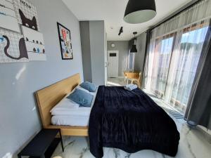 Posteľ alebo postele v izbe v ubytovaní Apartments Warsaw Pawia by Noclegi Renters