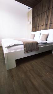 Postel nebo postele na pokoji v ubytování Apartmány Na Vyhlídce