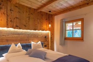 Ein Bett oder Betten in einem Zimmer der Unterkunft Chalet Mornà