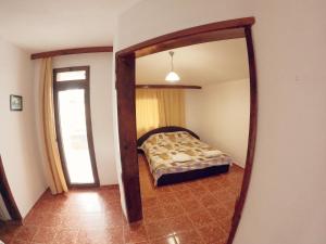 Postel nebo postele na pokoji v ubytování Hotel Garant