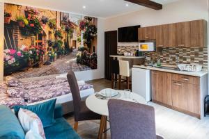 Kuchyň nebo kuchyňský kout v ubytování Allium Apartment