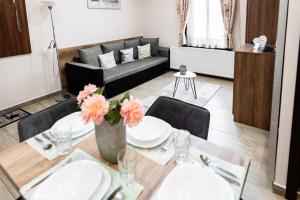 Posezení v ubytování Allium Apartment